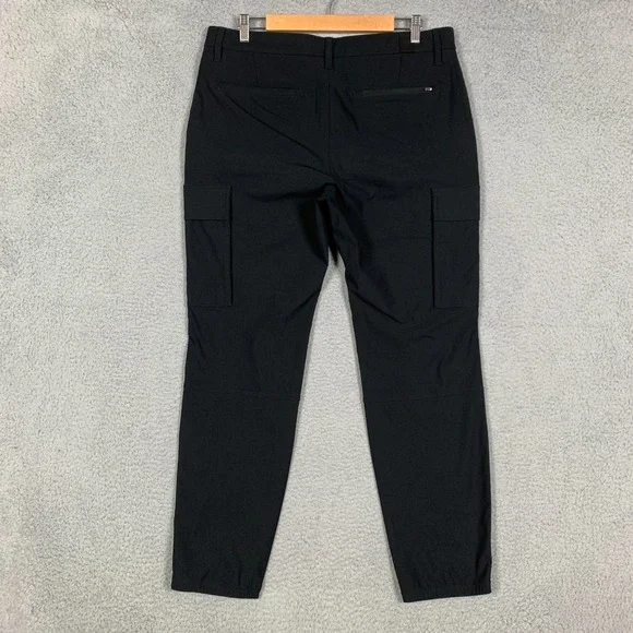 Vuori Meta Cargo Pants Men's 33 x 30 Black Performance VersaLife Stretch Travel